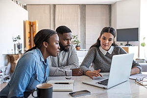 business owners discussing finances with an accountant