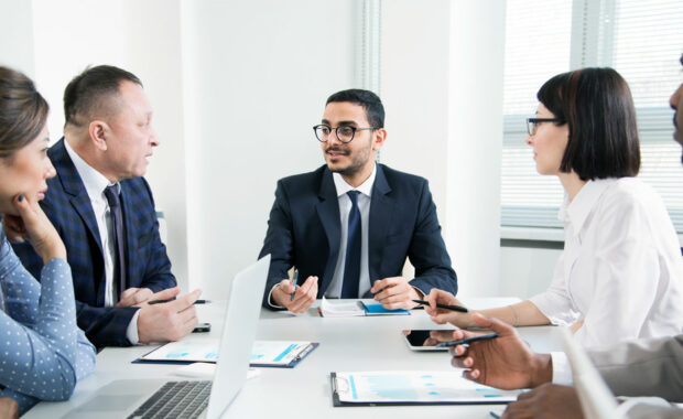 a tax reparation meeting between a business owner and an outsourced accounting firm