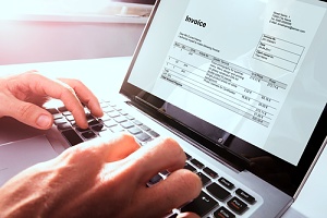 an invoice being paid through accounts payable services