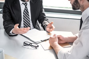 business people negotiating a contract