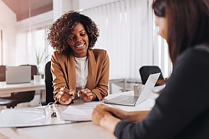 a business consultant who is meeting with a business owner