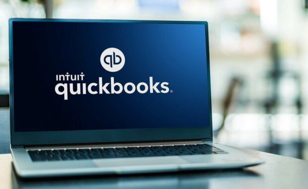 laptop computer displaying logo of quickbooks