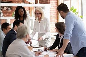 business partners holding a meeting to review budgets