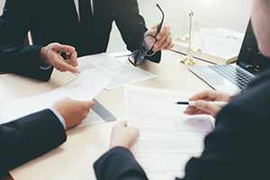 legal experts reviewing documentation in their office