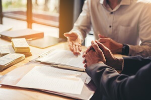 businessman reading documents at meeting