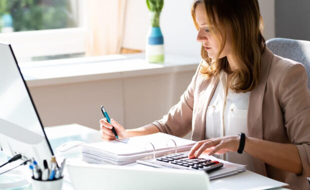 professional accountant woman in office doing accounting