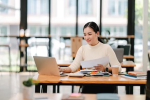 beautiful asian accountant in office