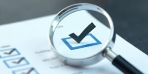 magnifying glass and check mark icon