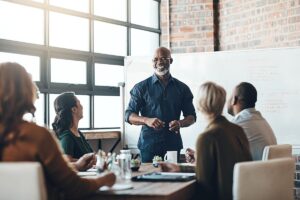 Shot of a businessman giving a presentation to his colleagues in a boardroom
