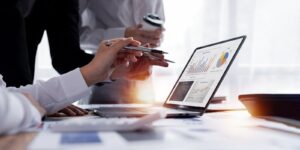 business team working at office with documents on his desk, doing planning analyzing the financial report