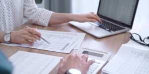 professional female bookkeeper or auditor are working on business finances with a colleague