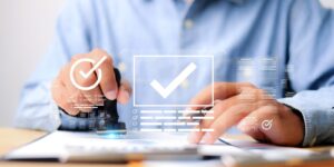 businessman stamping approved documents with digital checkmark interface