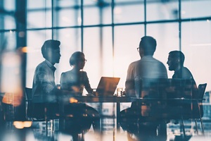 corporate people working together in the conference room of their office