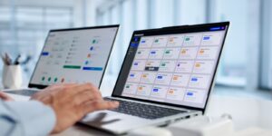 man organizing contracts and invoices