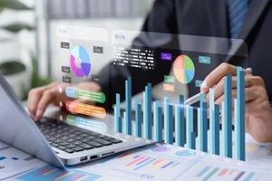 data analysis is conducted using digital charts and financial dashboards, visualizing stock market performance metrics
