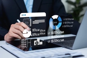 businessman uses a digital checklist to manage budgeting and accounting activities